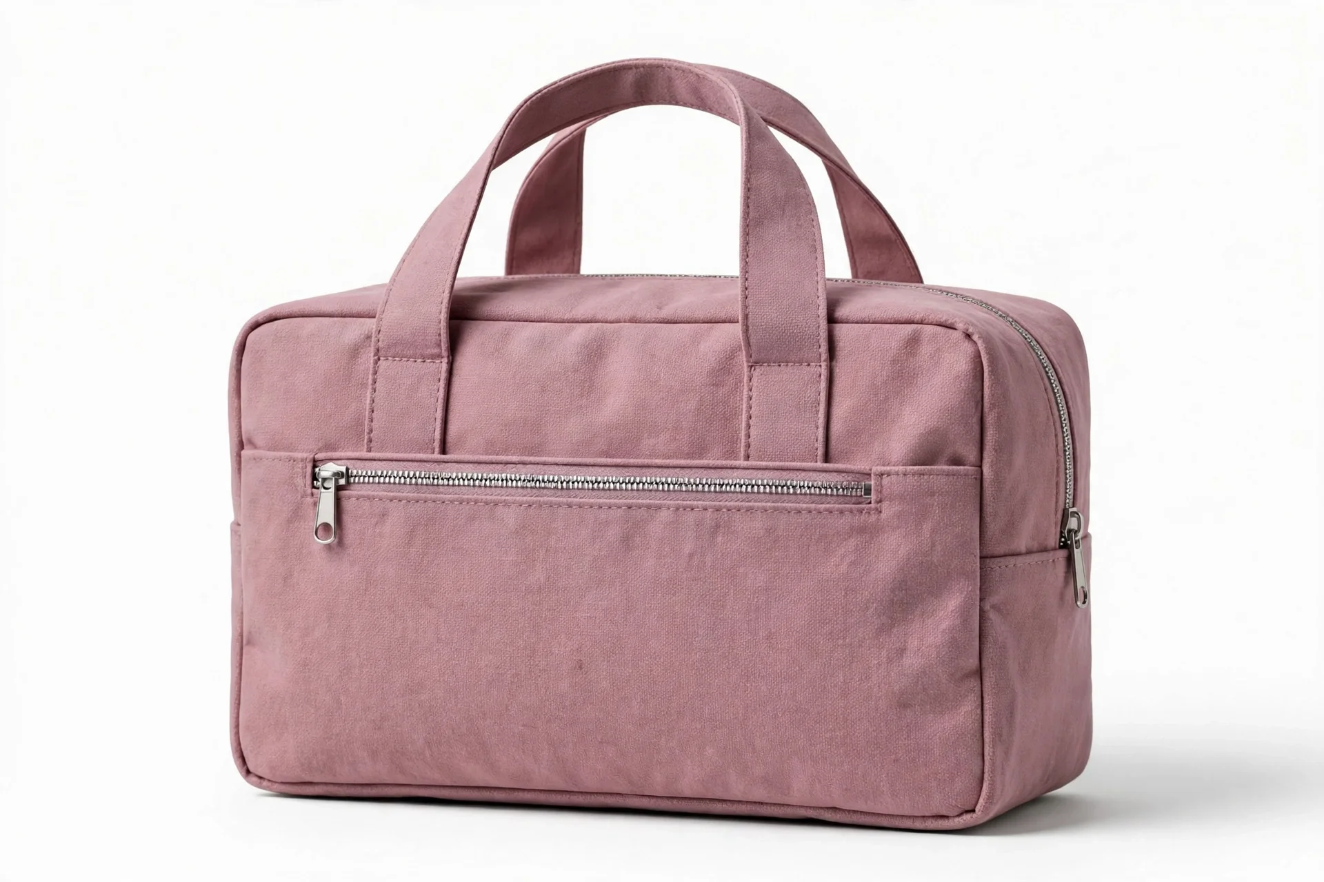 Dusty pink mauve rectangular toiletry bag with two top handles, a front zip pocket, and a side zip