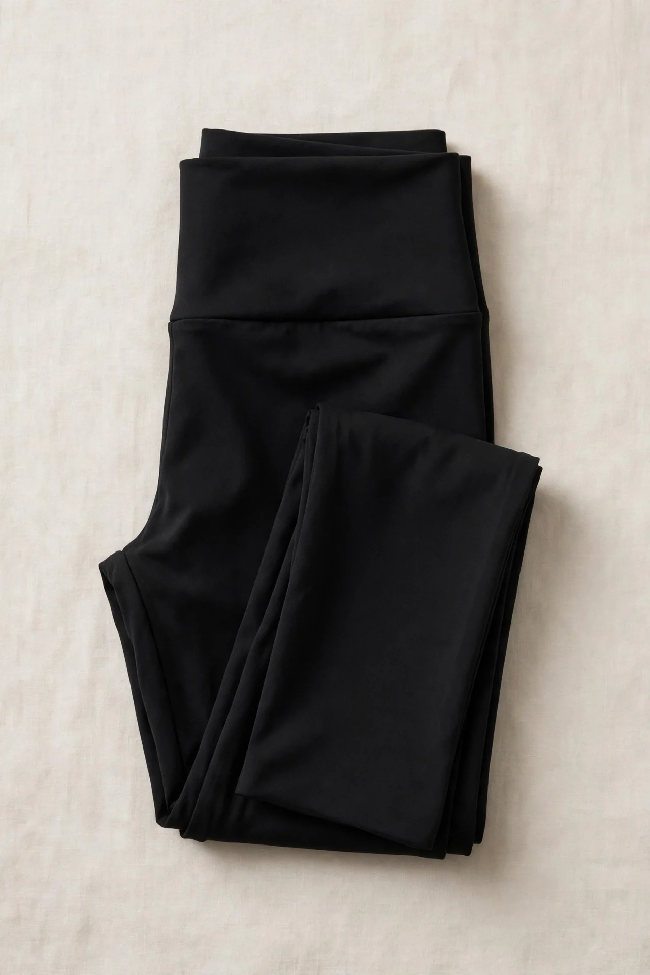 Black buttery leggings, folded