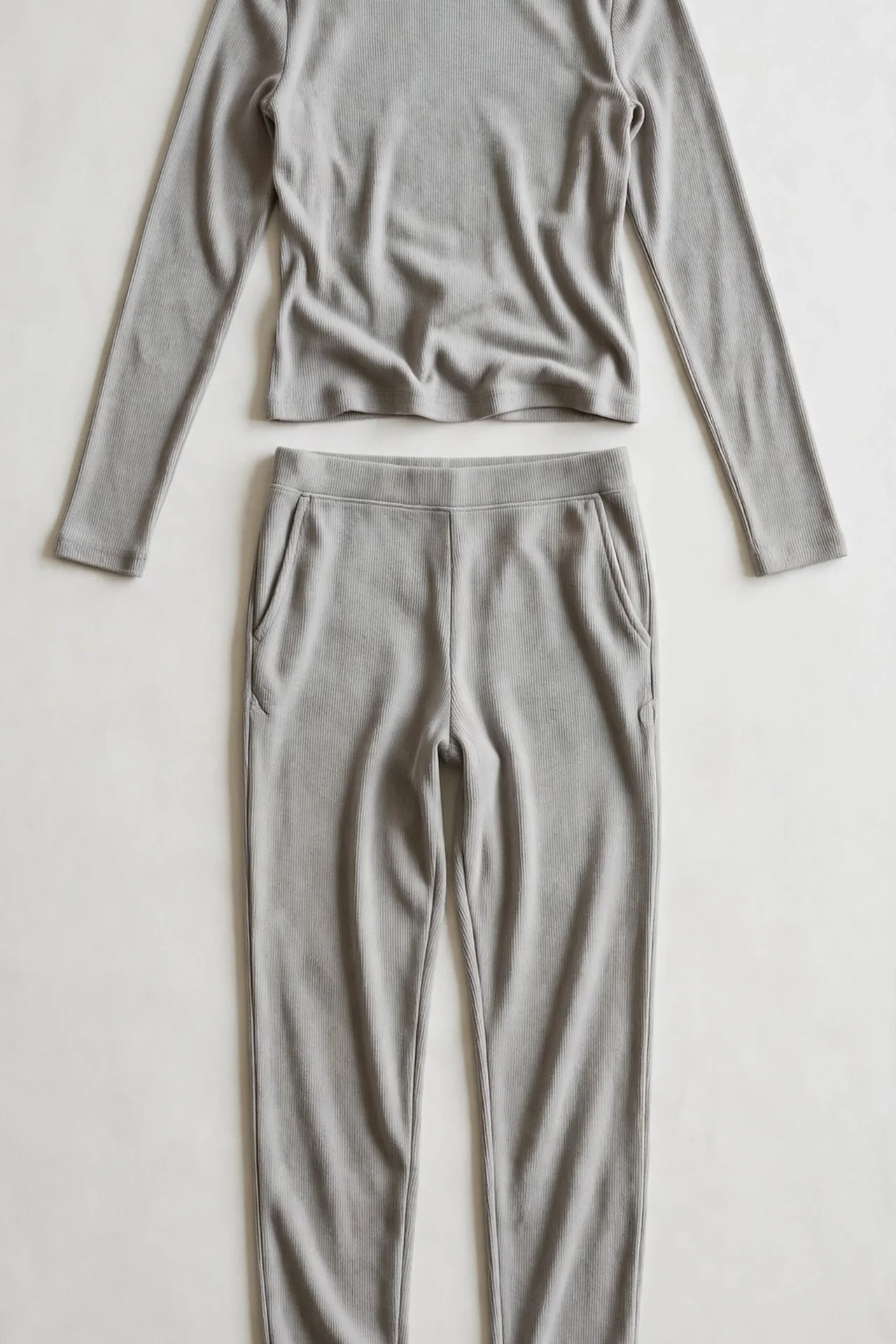 Grey fitted two-piece lounge set, flat lay