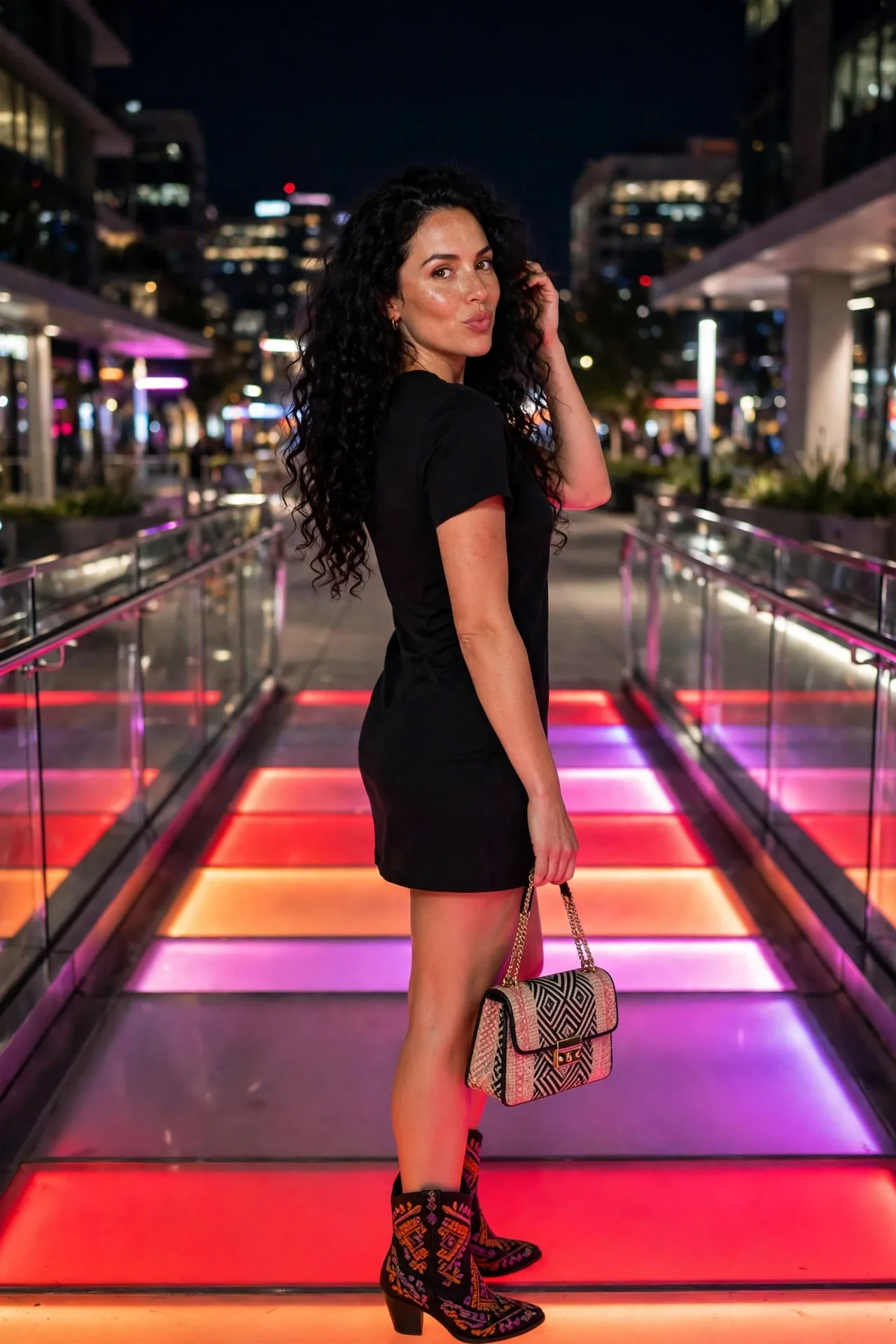 Chantel Brooks on a brightly lit walkway at night