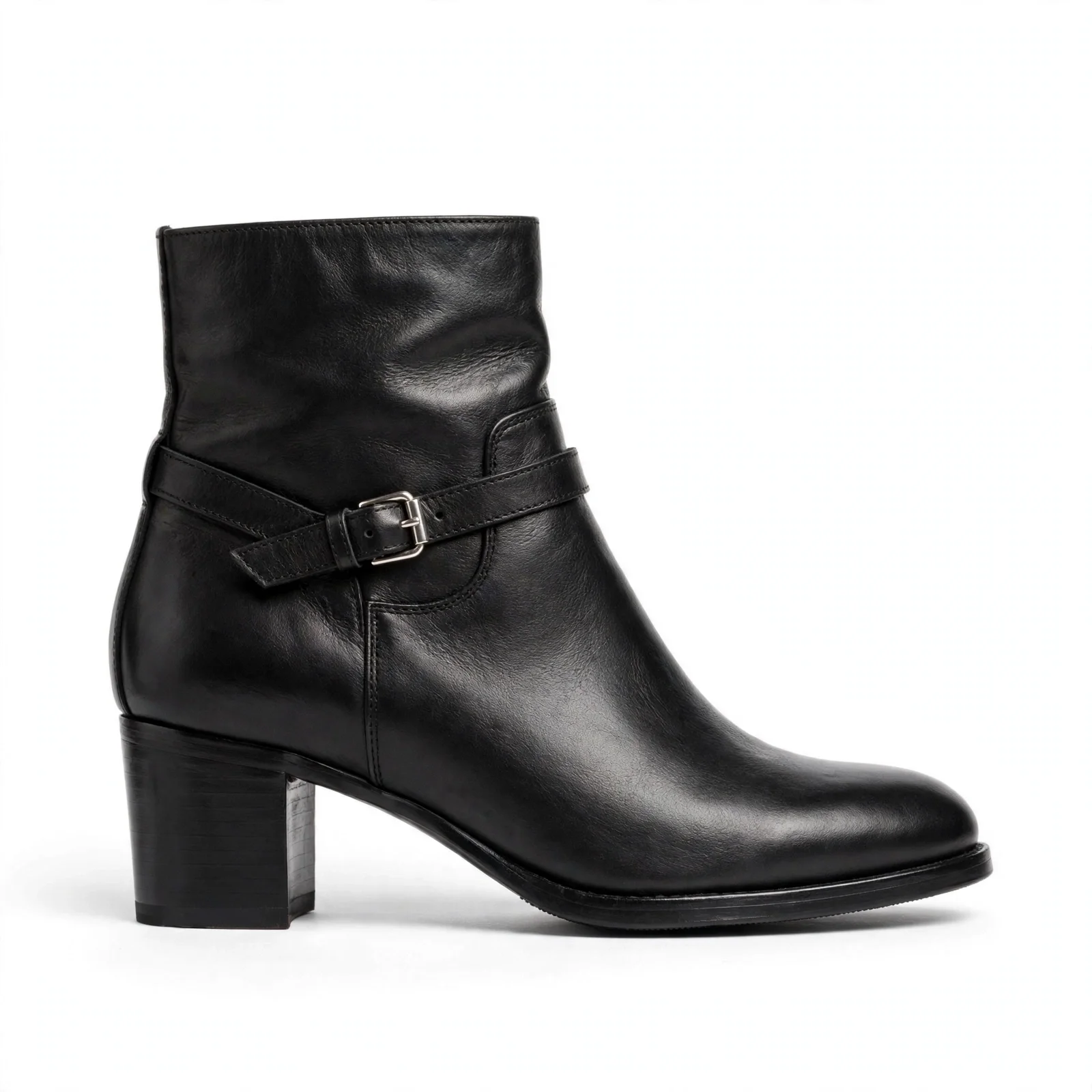 Single black leather ankle boot with a side buckle strap and low block heel, side view
