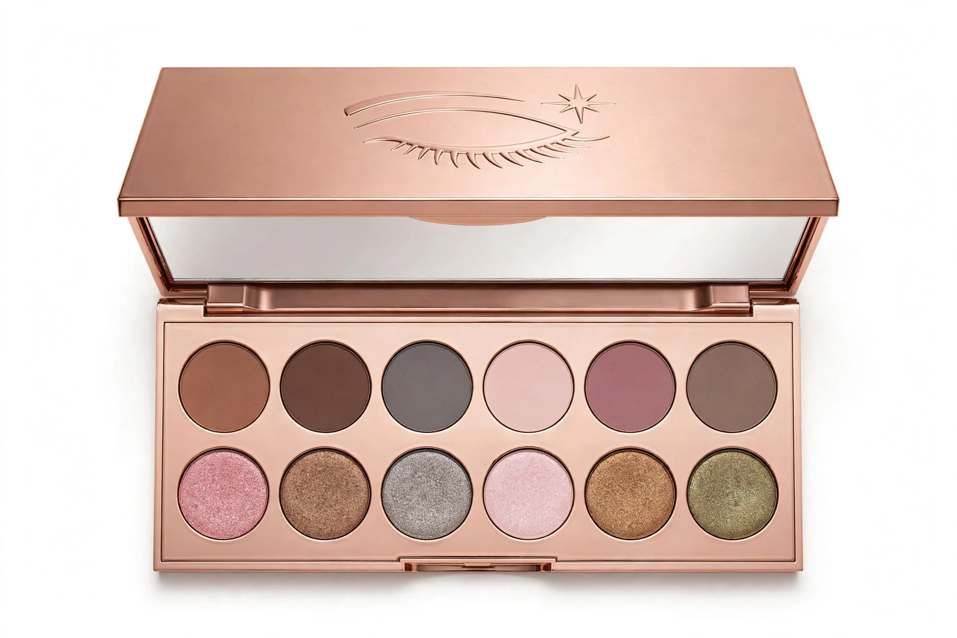 Open rectangular rose-gold eyeshadow palette with eye and star design on the lid, twelve pans in matte and shimmer shades
