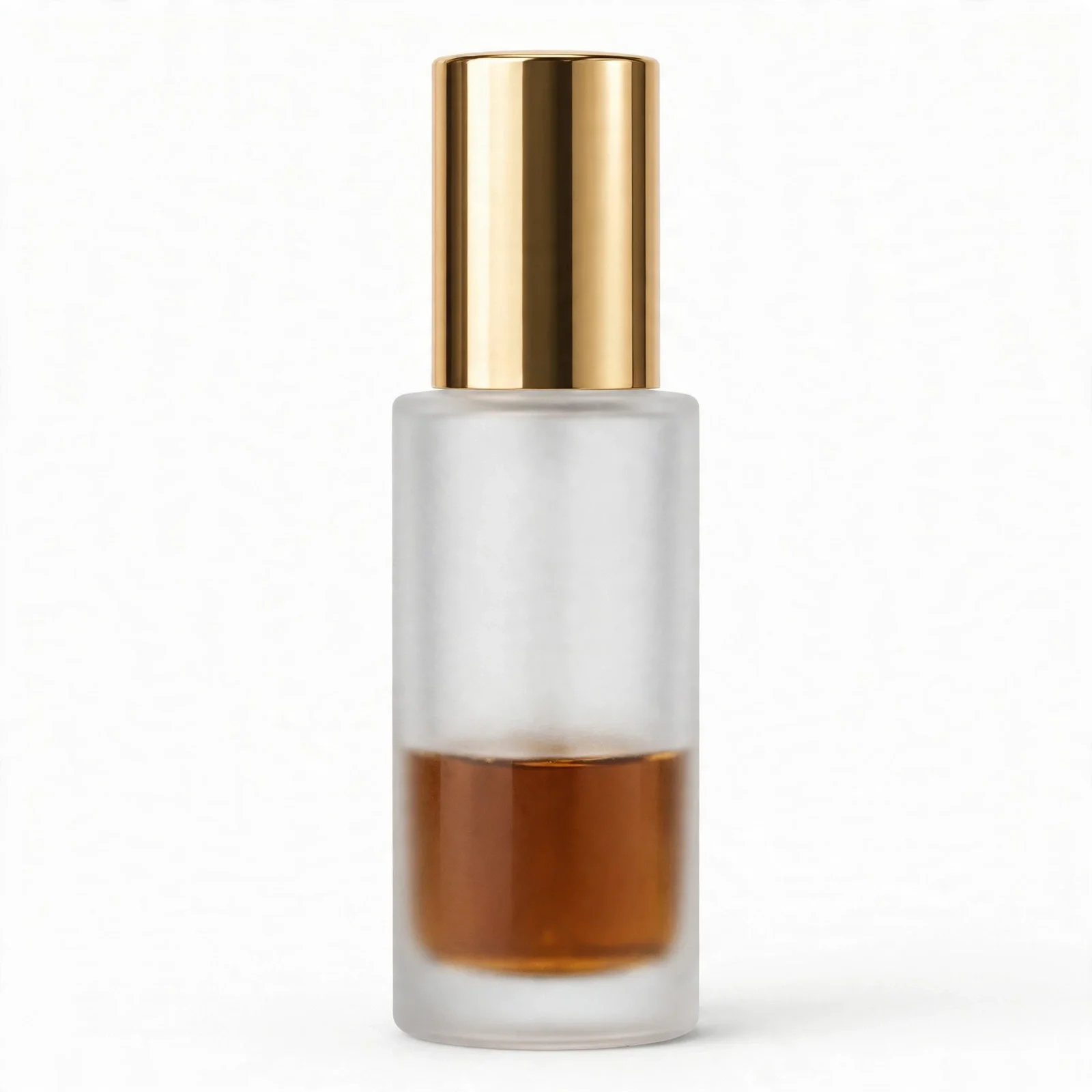 Frosted clear glass bottle with a tall shiny gold cap and amber-brown liquid in the lower portion