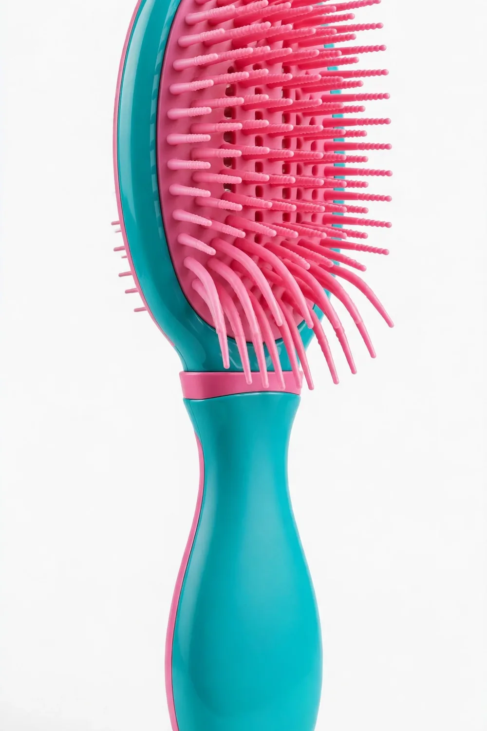 A colourful detangling hair brush