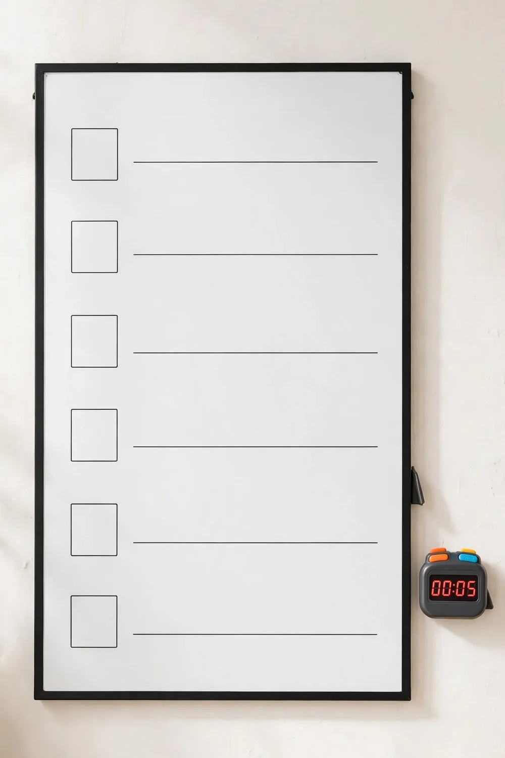 A dry-erase routine chart with a small timer