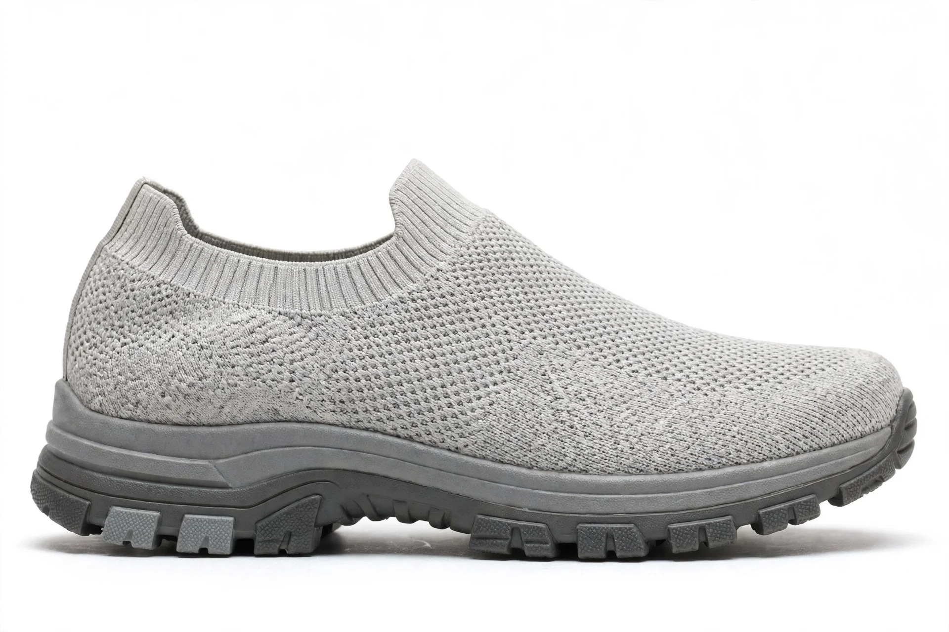 Light grey knit hands-free slip-on sneaker with a wide toe box and sturdy outsole