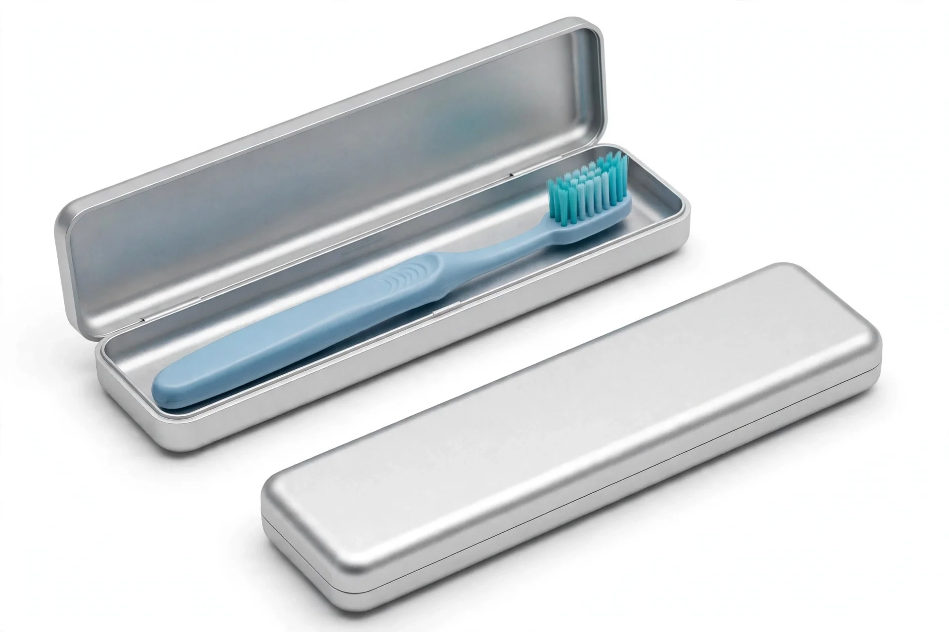 Two slim silver toothbrush cases, one open holding a light-blue toothbrush and one closed