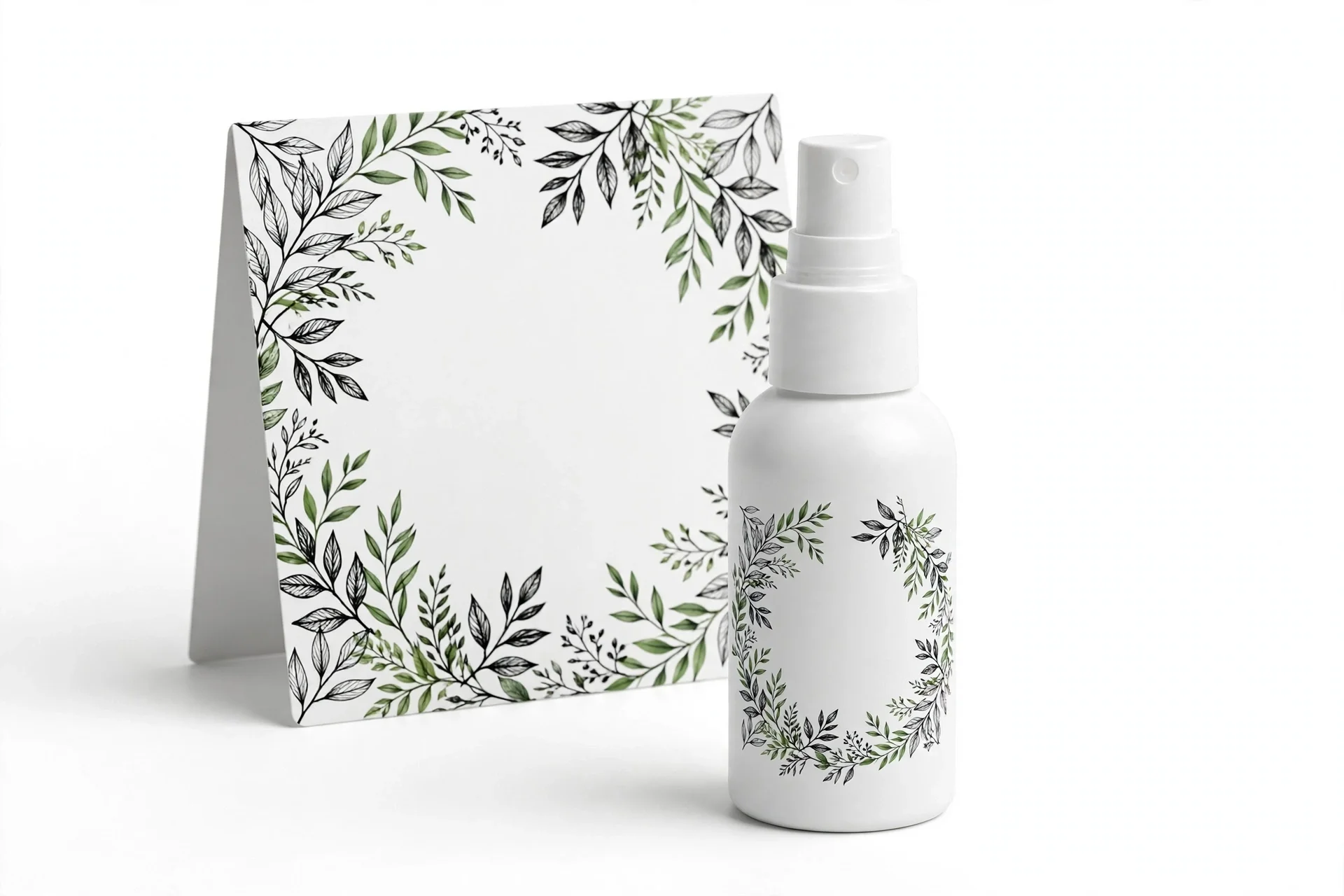 Small white pocket spray bottle beside a packaging card with green botanical graphics