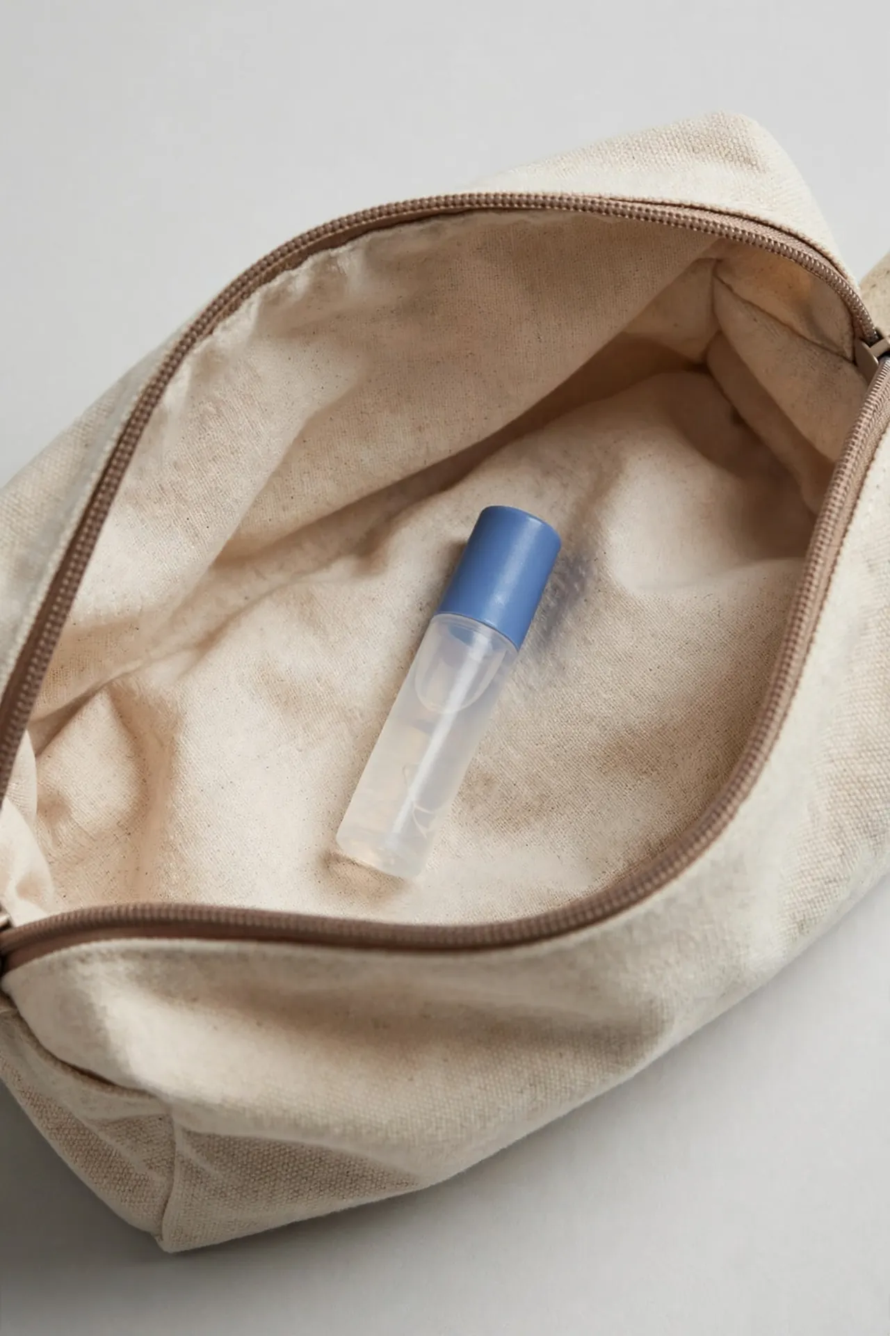 Small saline nasal gel tube in a toiletry bag