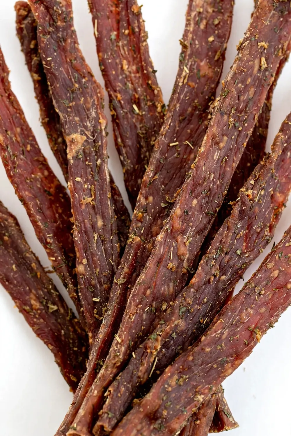 Strips of dried meat jerky treats for dogs
