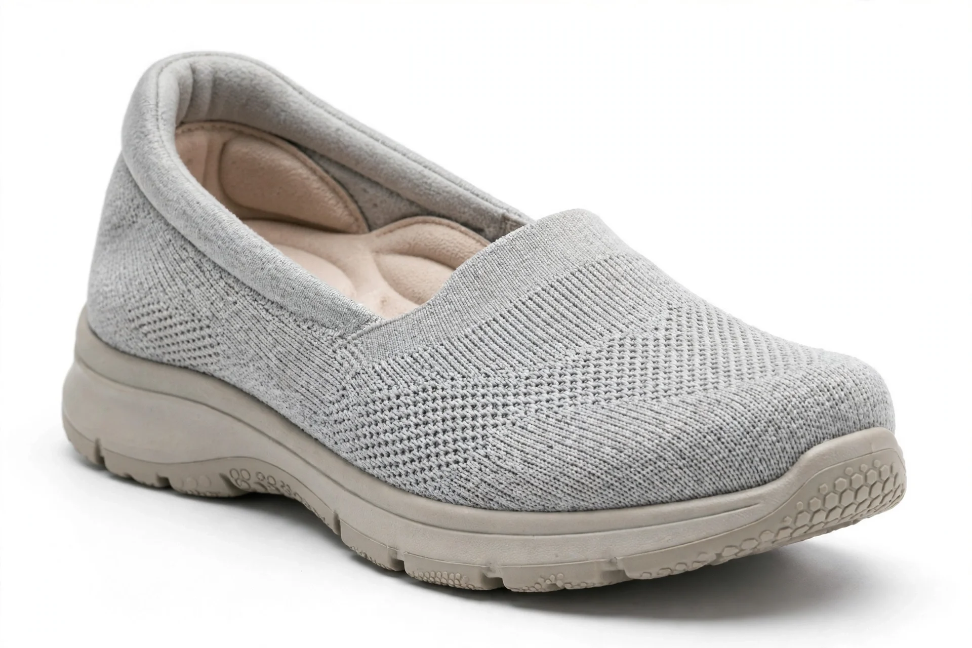 Light grey knit hands-free slip-on sneaker with a roomy toe box and cushioned orthotic insole